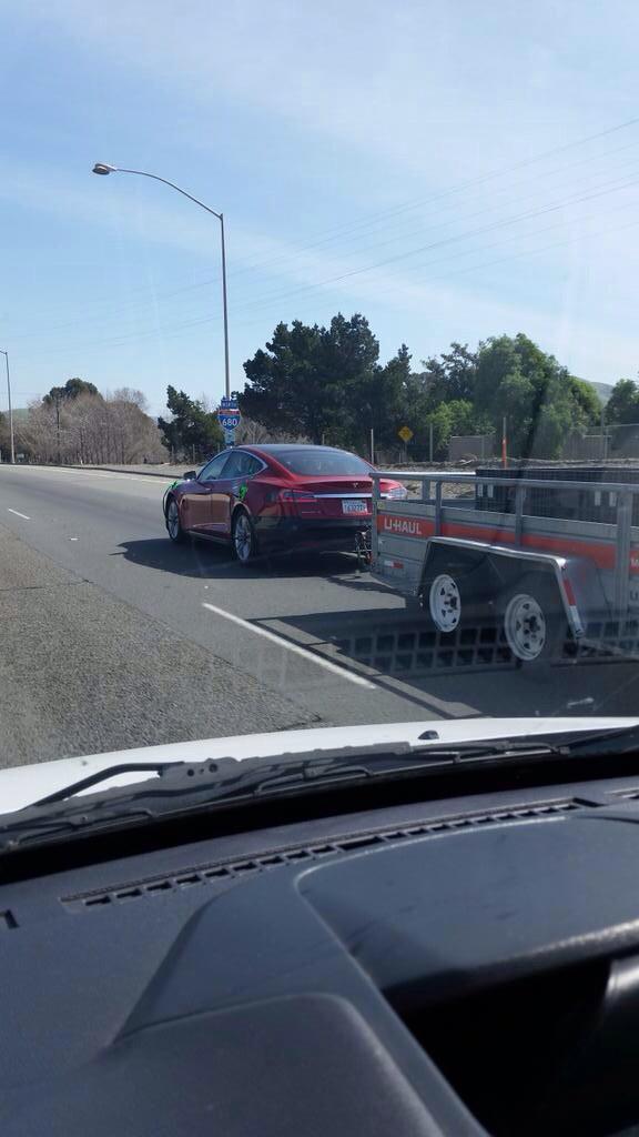 Tesla testing tow system | Electrek