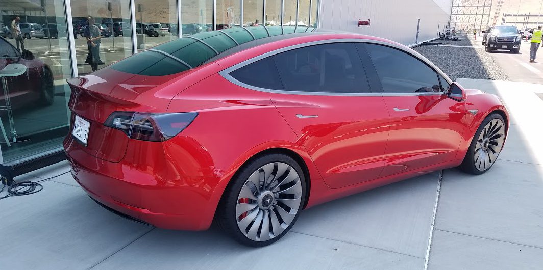 Tesla Model 3 rare red prototype displayed at the Tesla Gigafactory