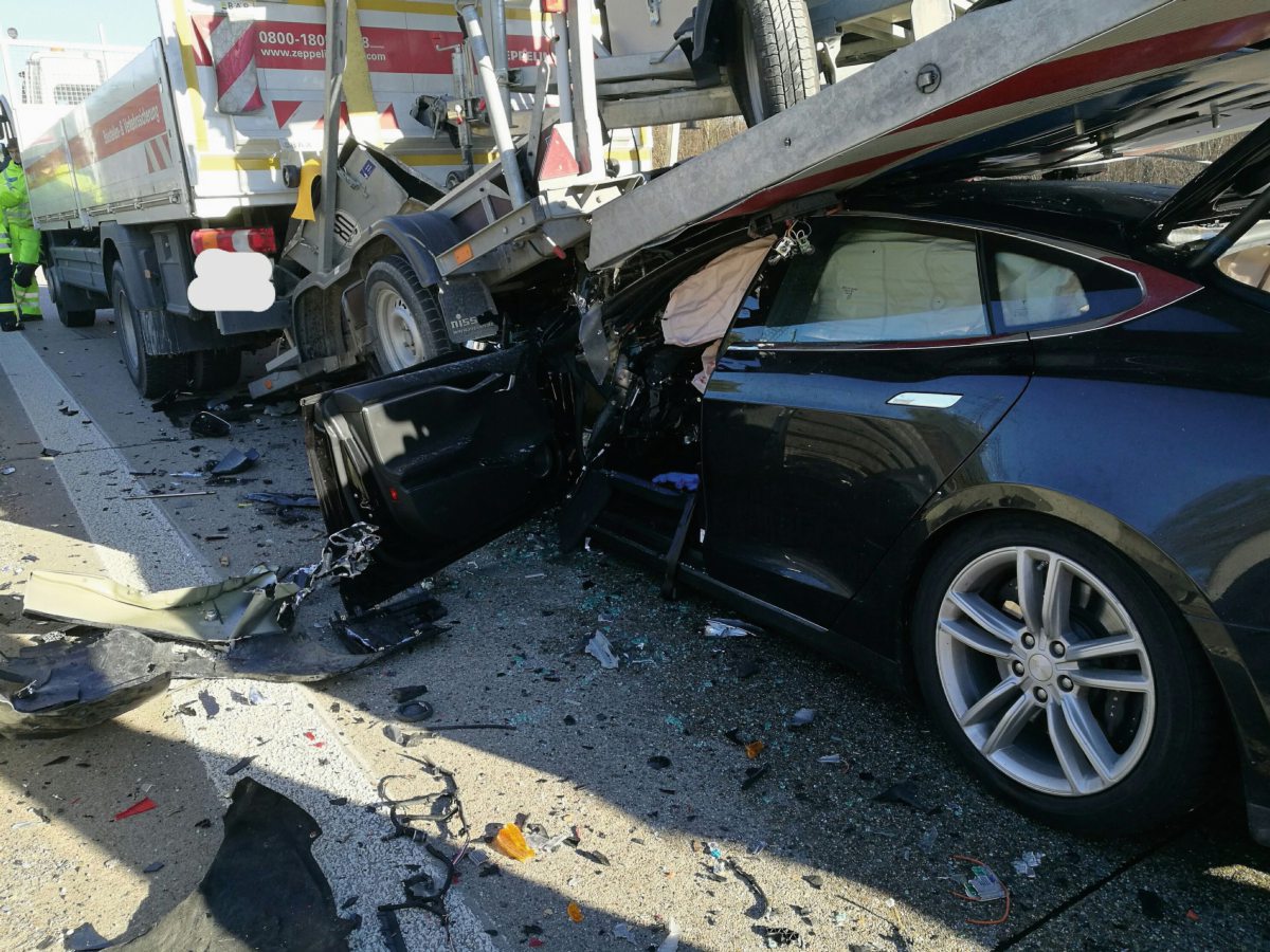 Tesla Model S driver walks away from crash with a truck at 'tremendous ...