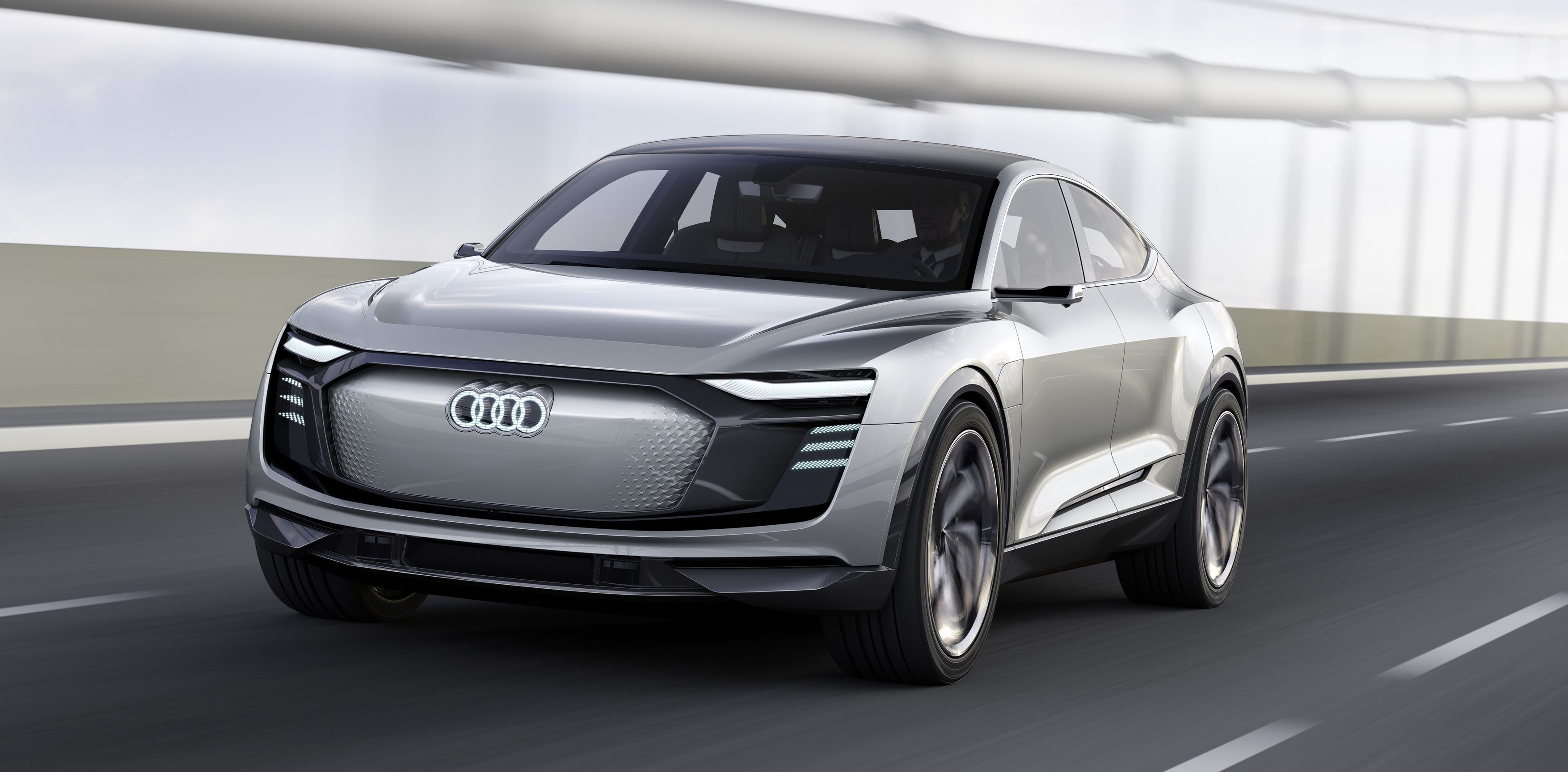 Audi unveils new etron Sportback with 300 miles of range, production