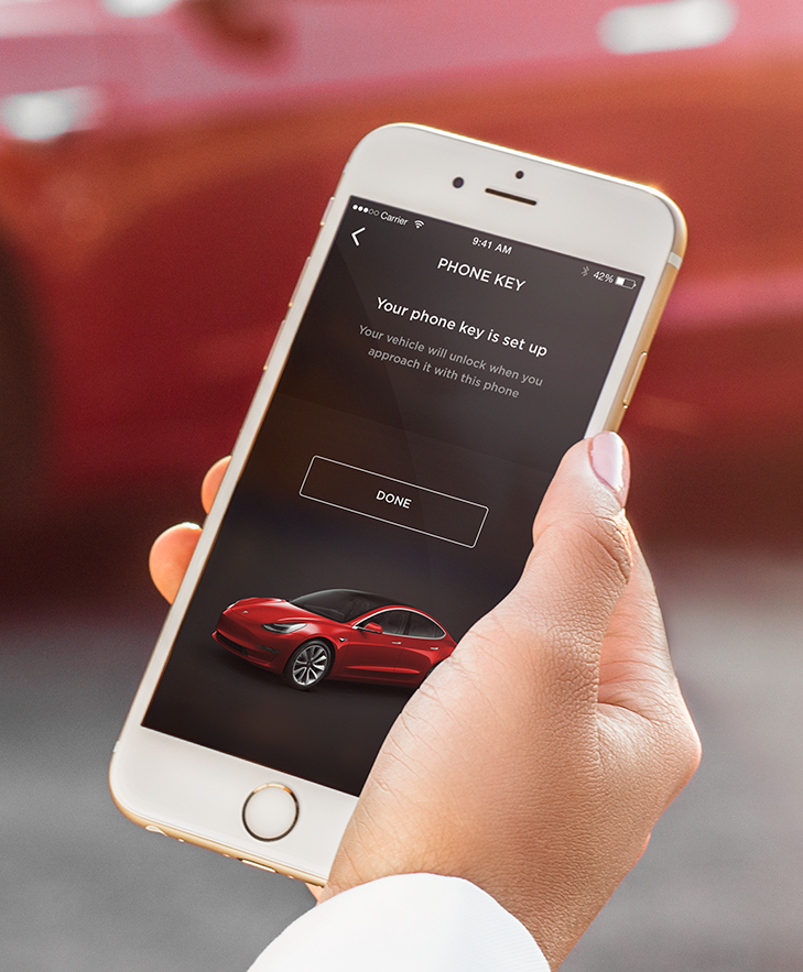 Tesla releases new Model 3 pictures to show its key card and iPhone