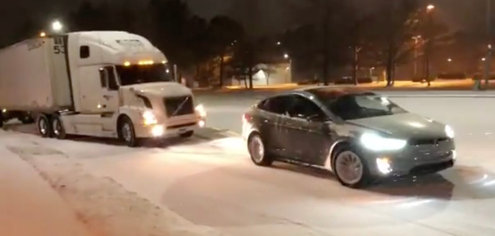 Watch A Tesla Model X All Electric Suv Pull A Semi Truck Out