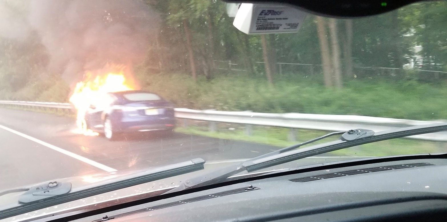 A Tesla Model S caught on fire on the highway after 'hitting a