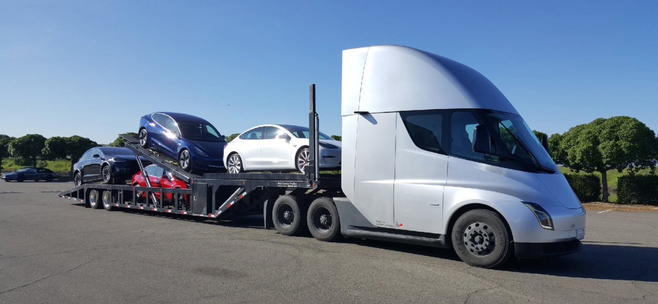 Tesla uses semi electric truck to deliver electric cars the