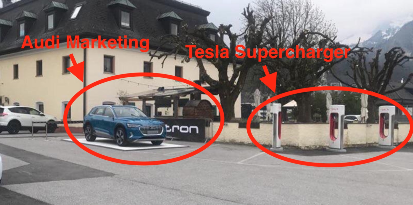 photo of Audi uses Tesla Supercharger stations to advertise e-tron electric SUV — smart or dumb? image