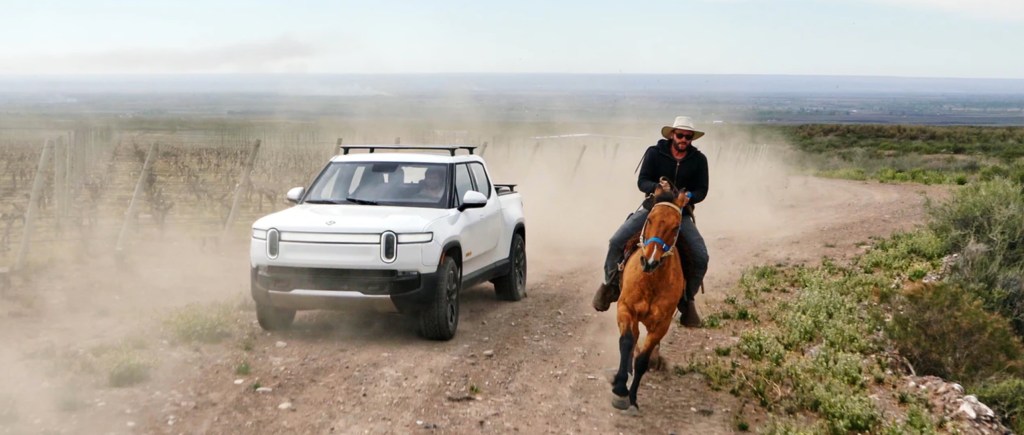 photo of Rivian R1T electric pickup traveled 314 miles on a charge, releases video off-roading image