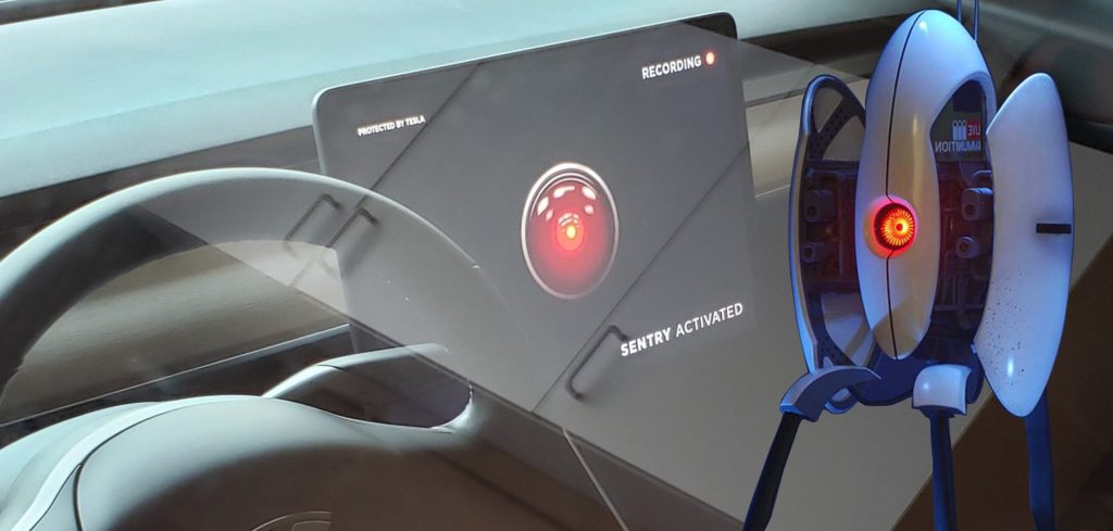 photo of Tesla gets in trouble for using HAL 9000 for Sentry Mode, switching to Portal turret image