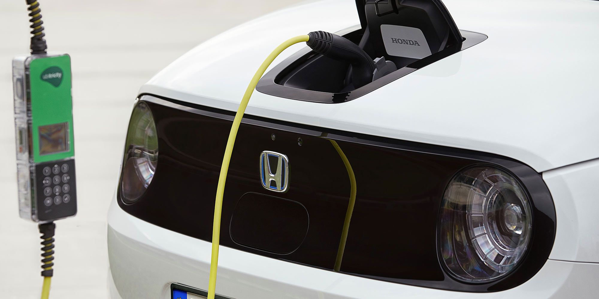 Honda e plugged in