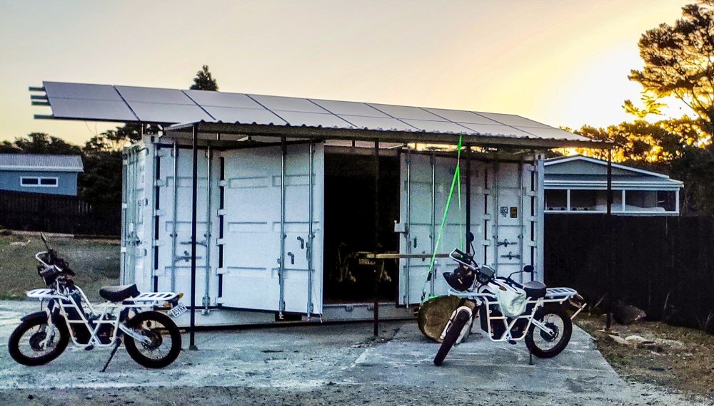 Check out this solar-powered electric motorcycle charging shipping container for eco-tourism