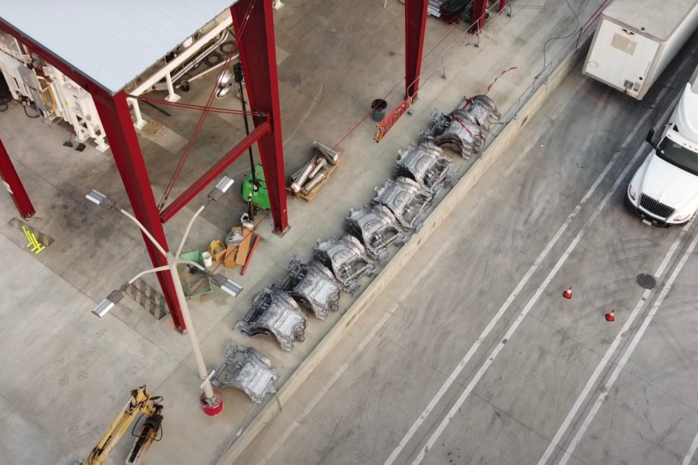 Drone flyover of Tesla's massive new casting machine shows new parts