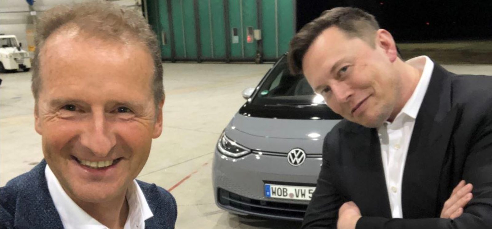 VW CEO Hebert Diess Tesla CEO Elon Musk selfie hero