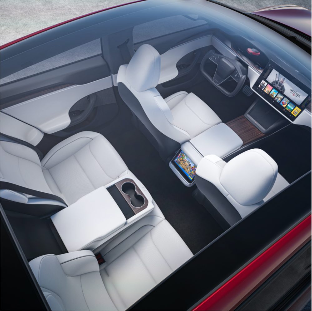 Tesla unveils new Model S with new interior, crazy steering wheel, and