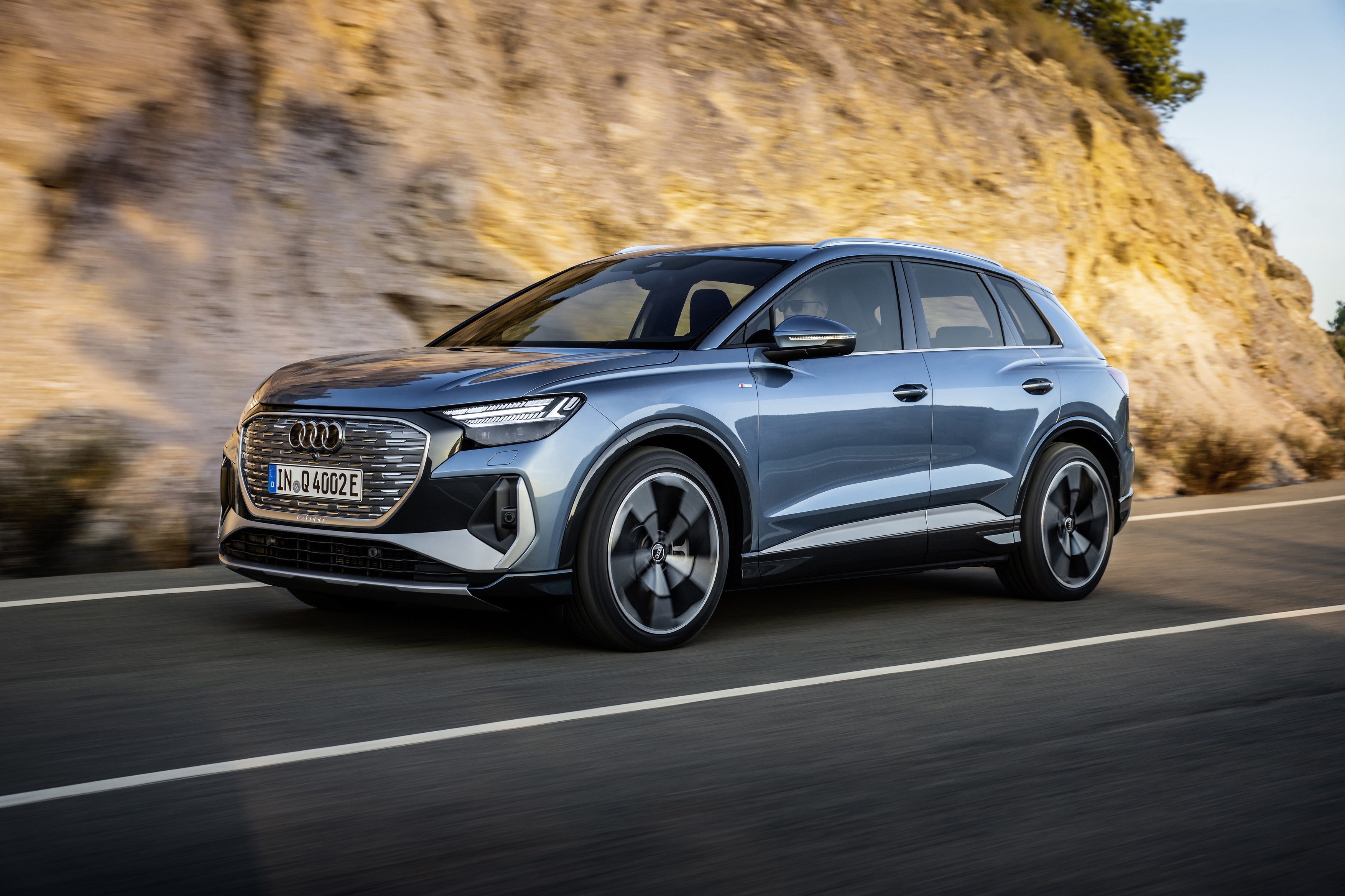 Audi unveils production version of e-tron Q4 electric SUV with over 300  miles of range