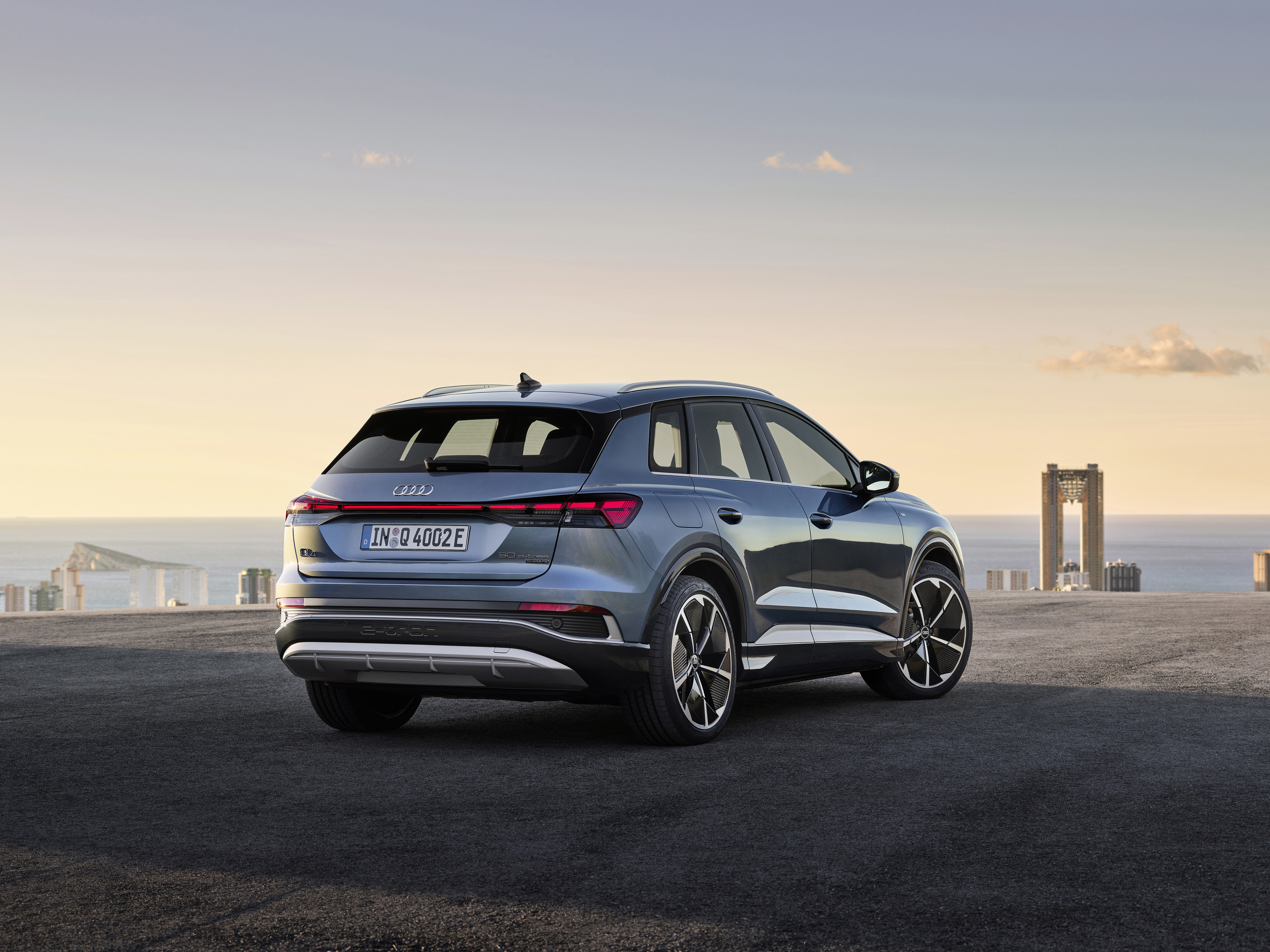 Audi unveils production version of e-tron Q4 electric SUV with over 300 ...