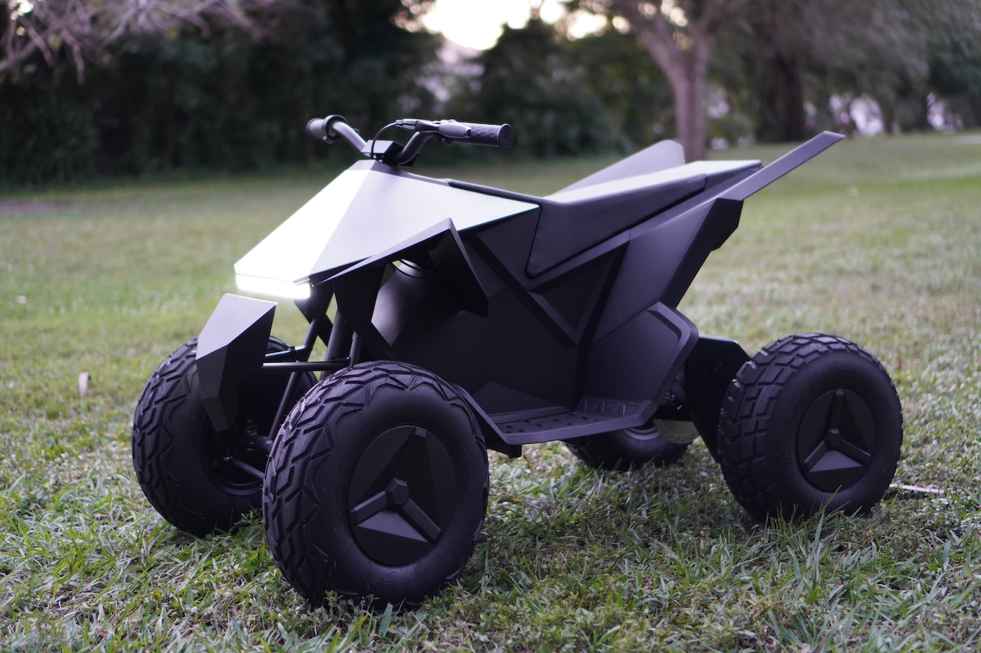 Tesla cybertruck best sale quad bike price