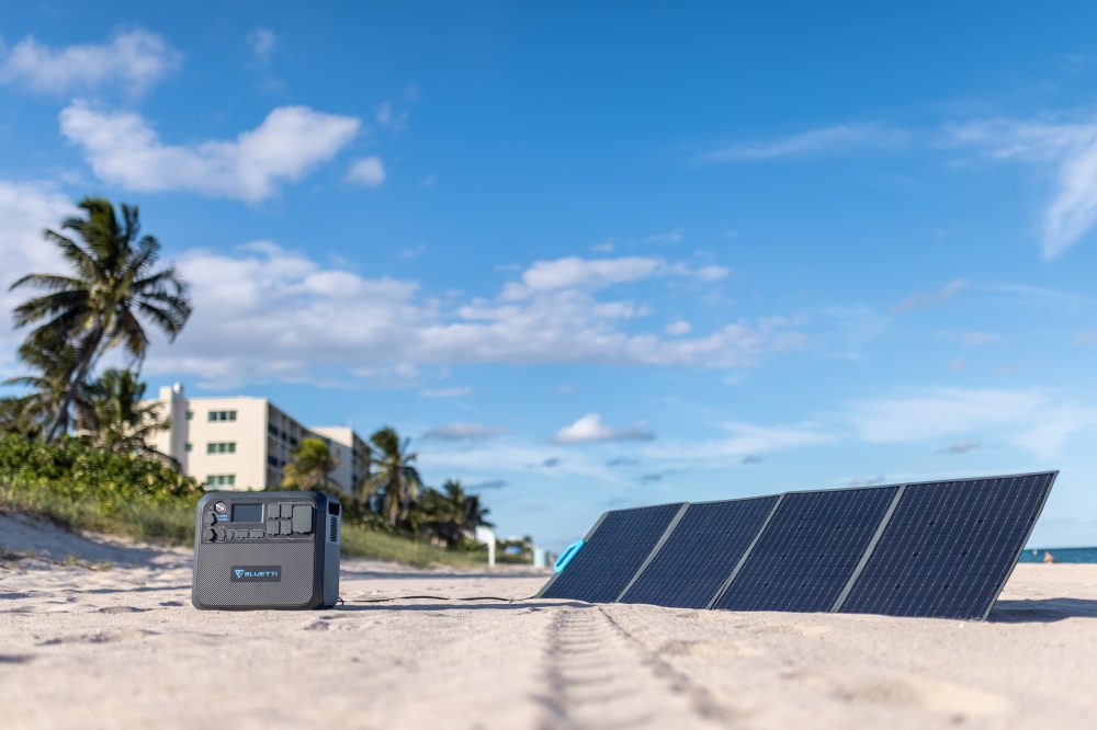 Bluetti AC200MAX on the beach with 4 solar panels