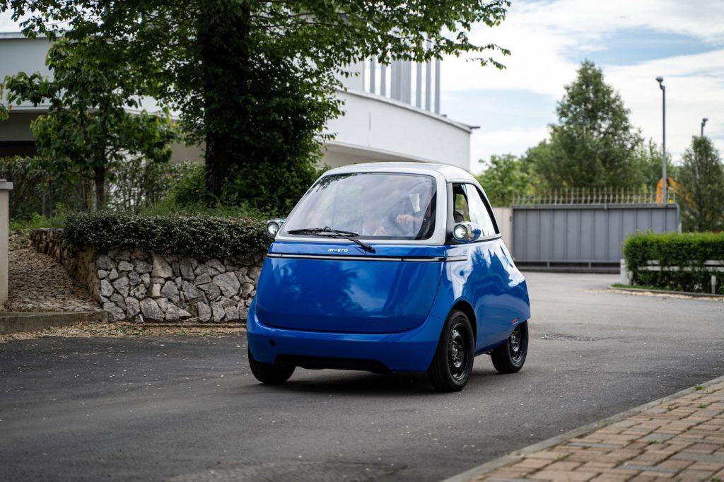 small, electric microlino car soon to be driving along european