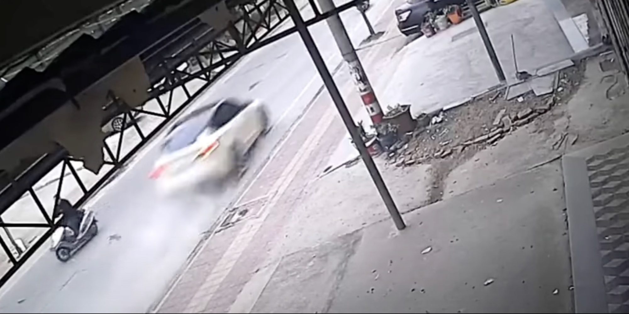Dramatic video shows car accident near miss with family crossing