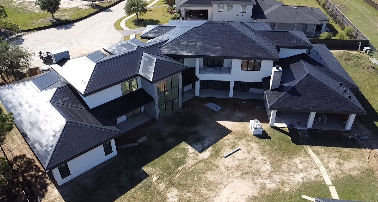 Check out this ultimate Tesla house with solar roof, Powerwalls, and