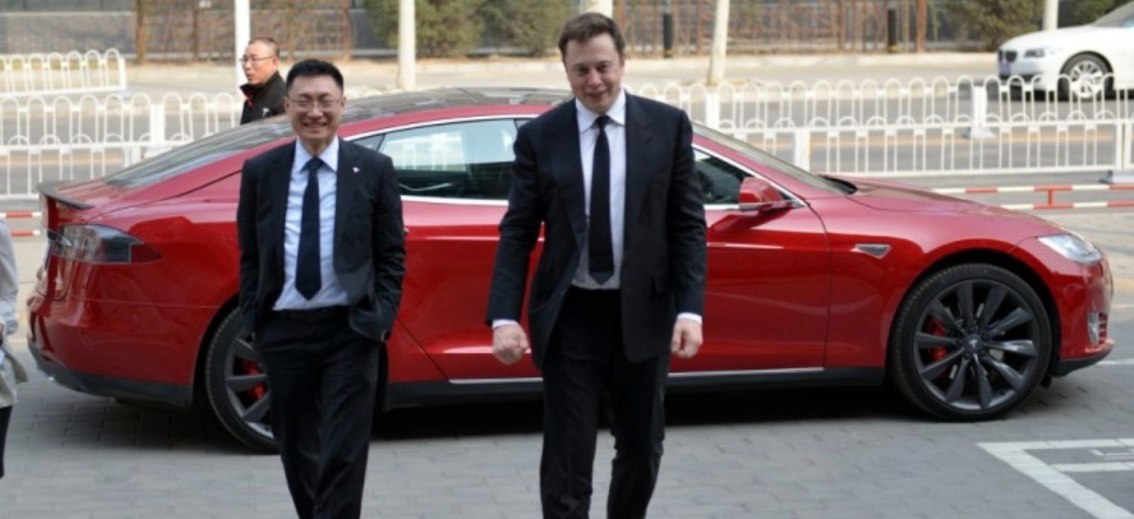 Tom Zhu, President of Tesla China, with Elon Musk