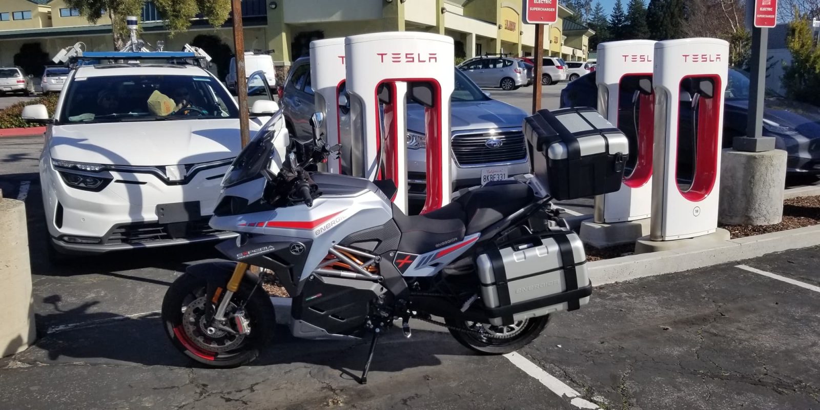 Long range electric motorcycles are now charging up at Tesla Superchargers