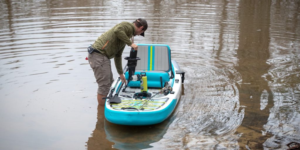 small sailboat with outboard motor