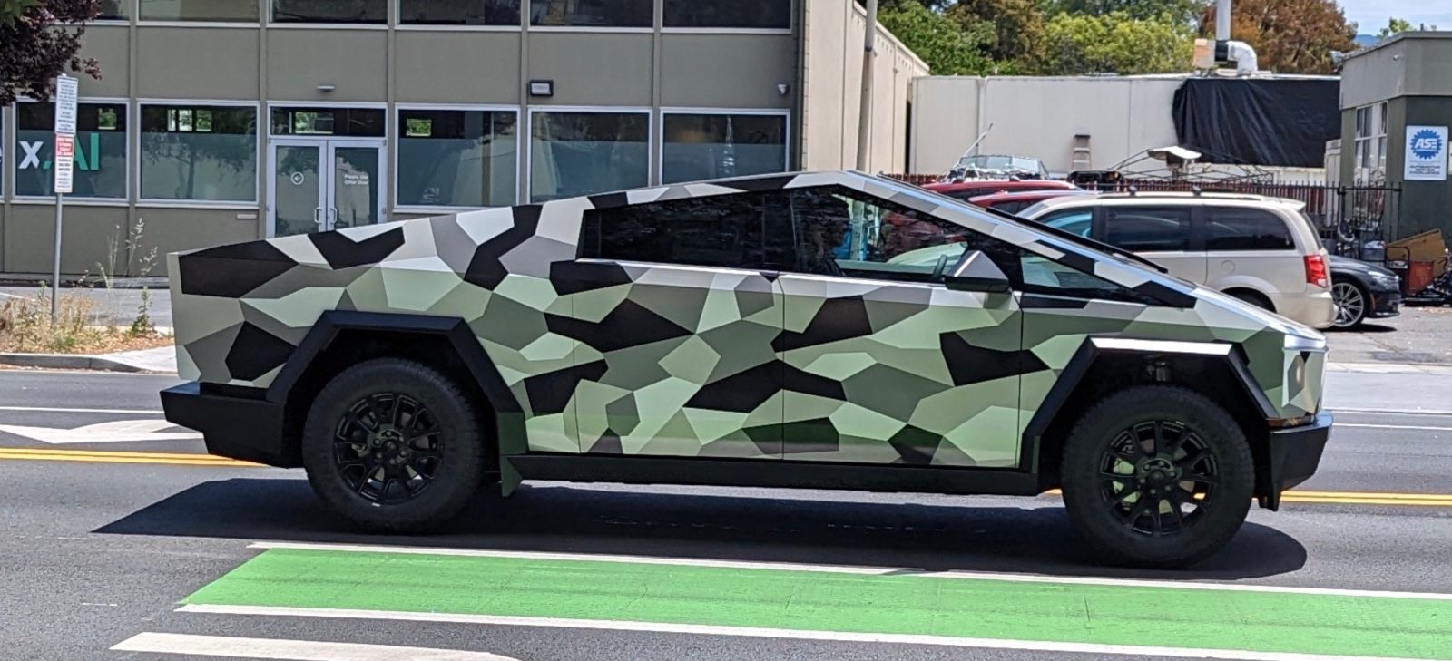 Tesla Cybertruck spotted with camouflage starts rumors