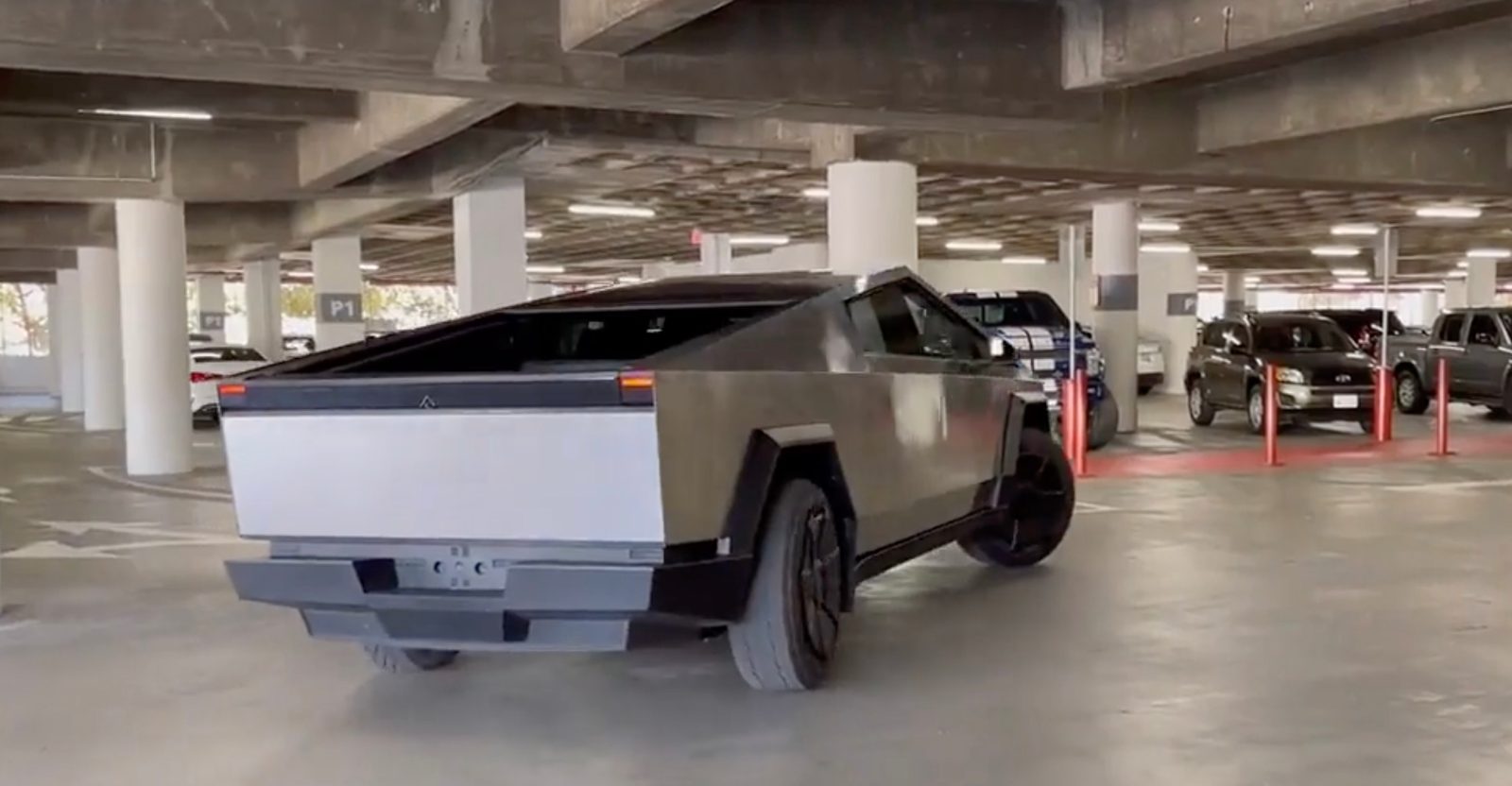 Tesla Cybertruck showcases rear-wheel steering inside parking garage