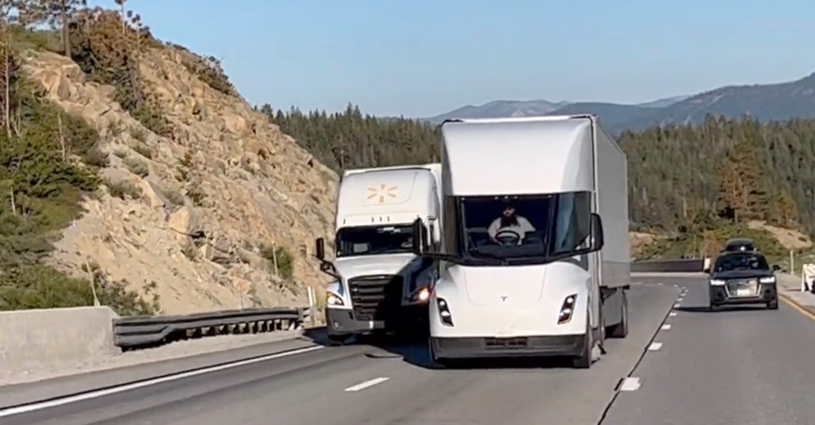 Watch Tesla Semi blow past diesel trucks up a hill | Electrek