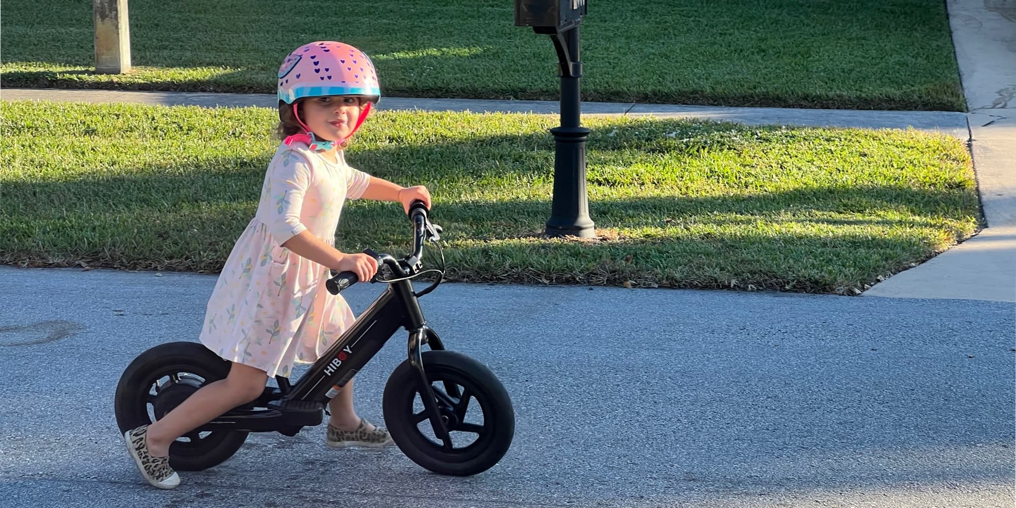 Child on outlet balance bike