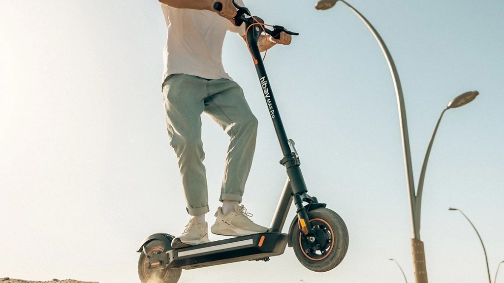 man riding Hiboy electric scooter