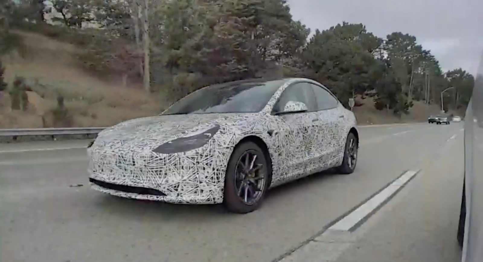 Tesla Model 3 camouflaged prototype