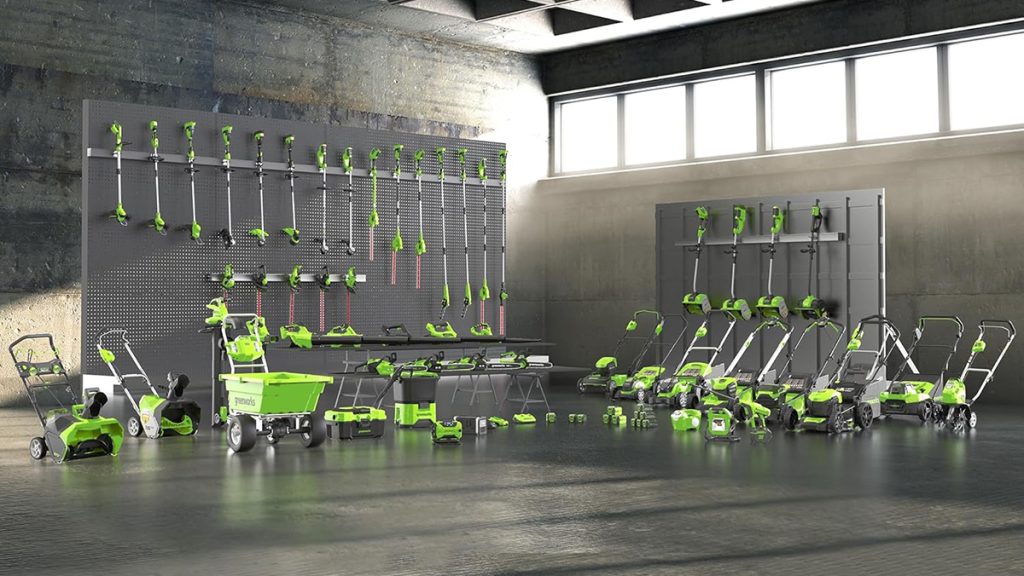 Promotional image of Greenworks tools in large garage/warehouse