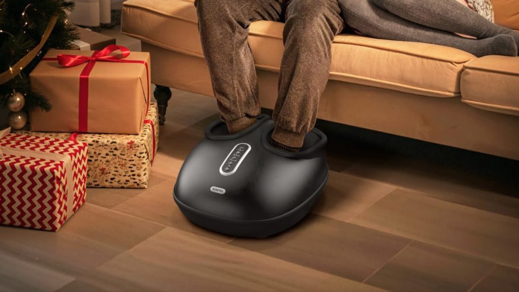 RENPHO foot massager next to Christmas tree and presents