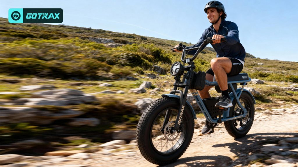 man riding GoTrax R7 e-bike down rocky trail