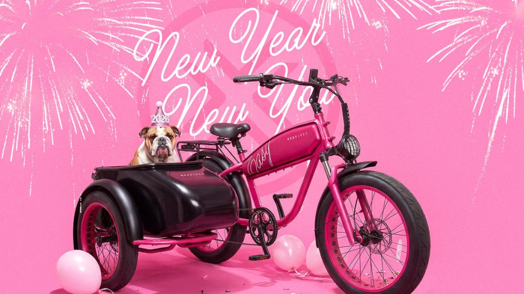 MOD e-bikes New Year Sale banner with pink e-bike and bulldog