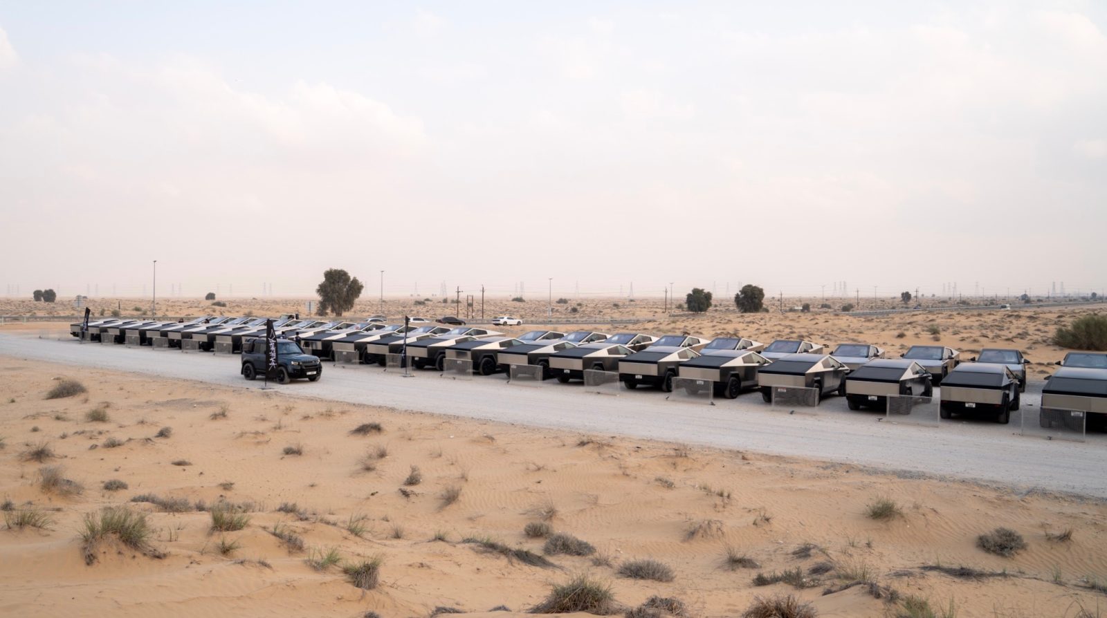 Tesla Cybertruck delivery event in UAE with customers receiving vehicles in Dubai