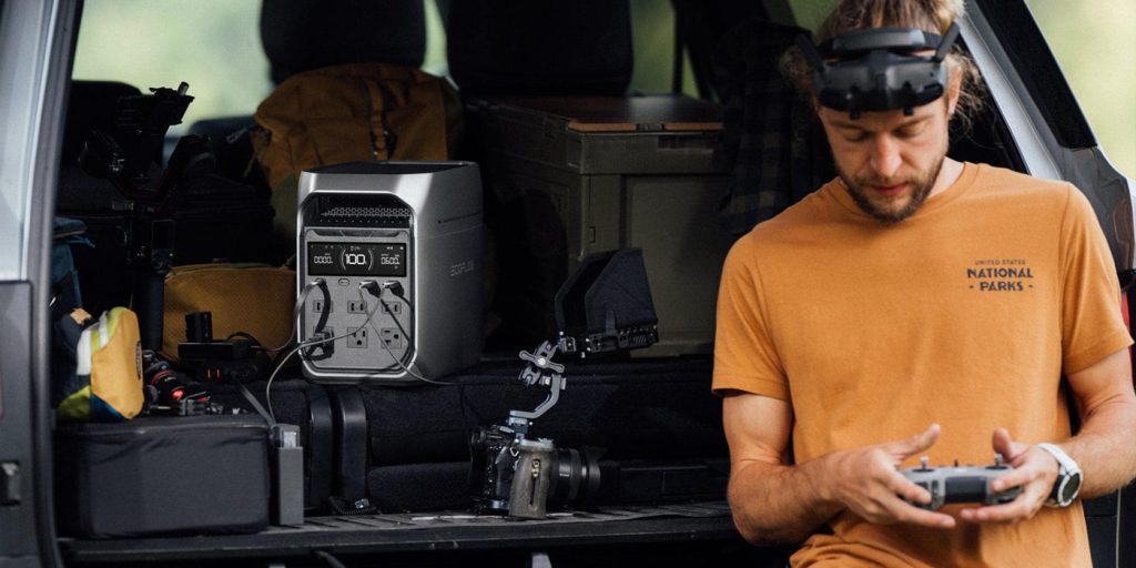 man using EcoFlow power station to power drone