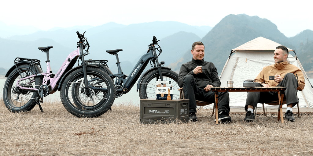 two men camping with Hiboy EX11 e-bikes