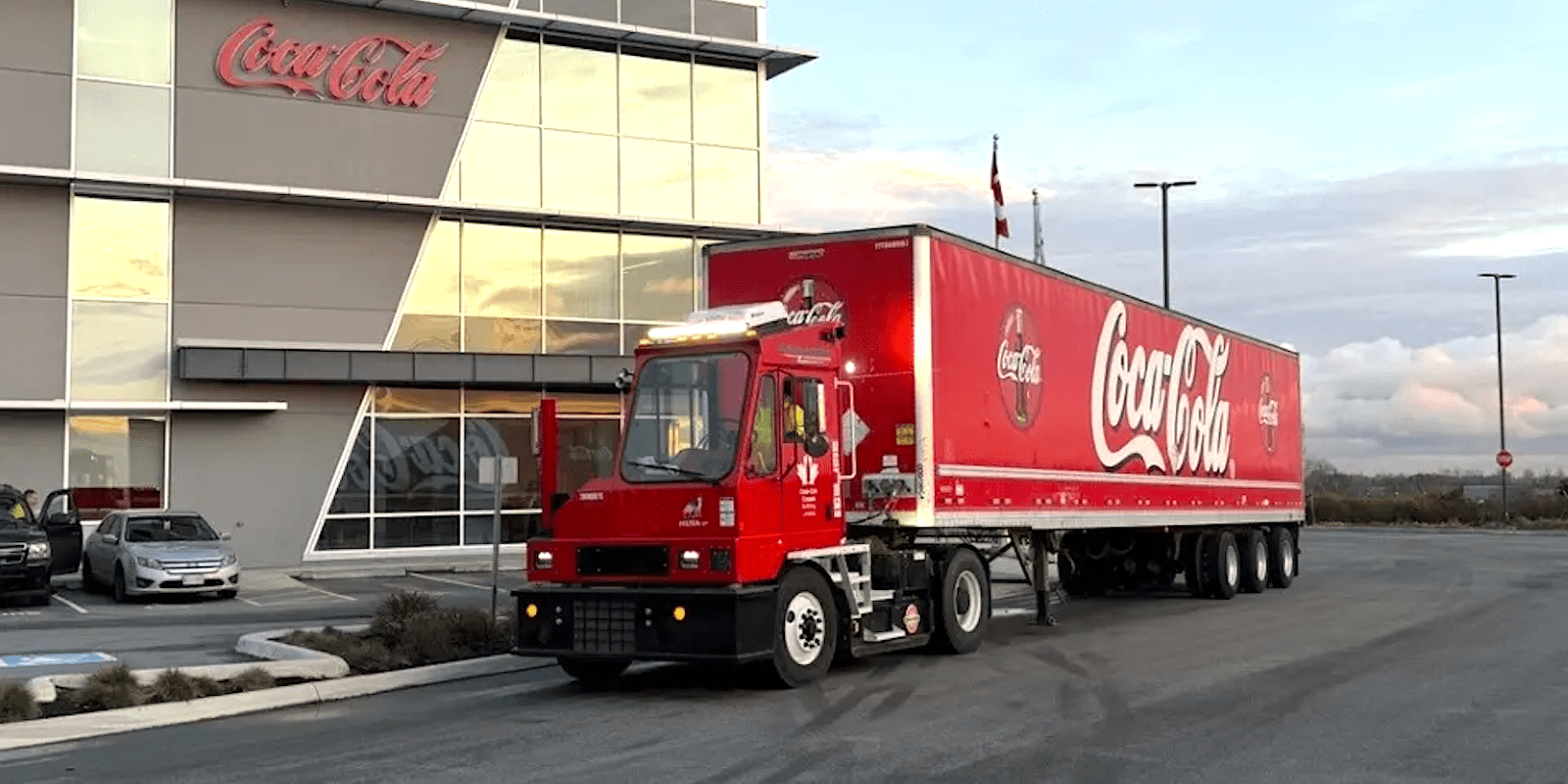 Orange EV delivers 2,000th electric terminal truck to Coke Canada Bottling