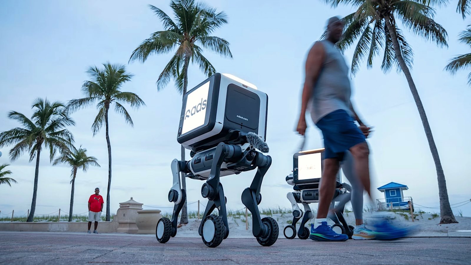 Wheel-legged robot dog dumps packages – and ads
