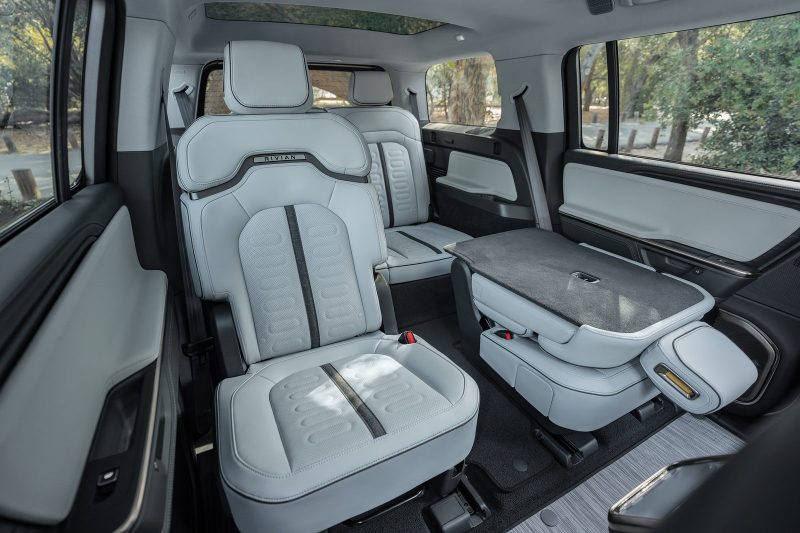 2027 Rivian R1S captain's chairs with center pass-through to the third row