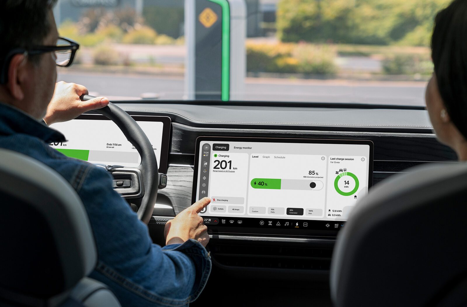 Rivian in-car display showing the RivianOS 2 charging and energy monitor screen