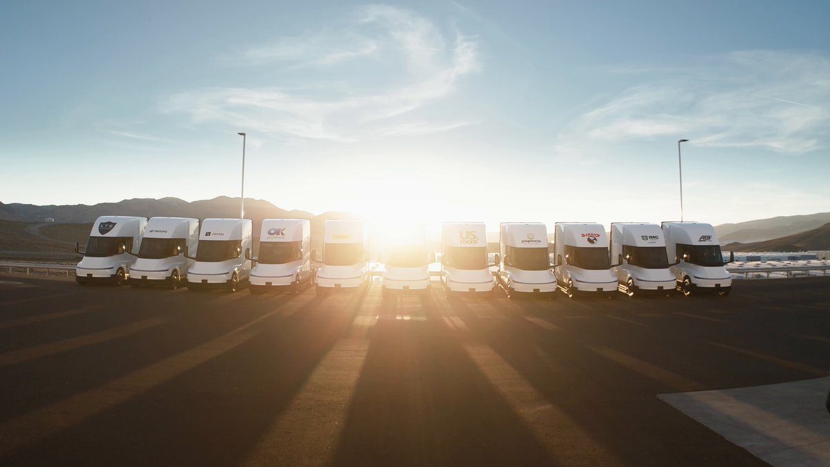 Tesla Semi trucks with customer logos at Nevada factory
