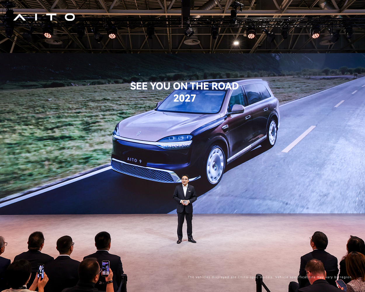 Clifford Kang of SERES Group on stage at AITO press conference in Paris