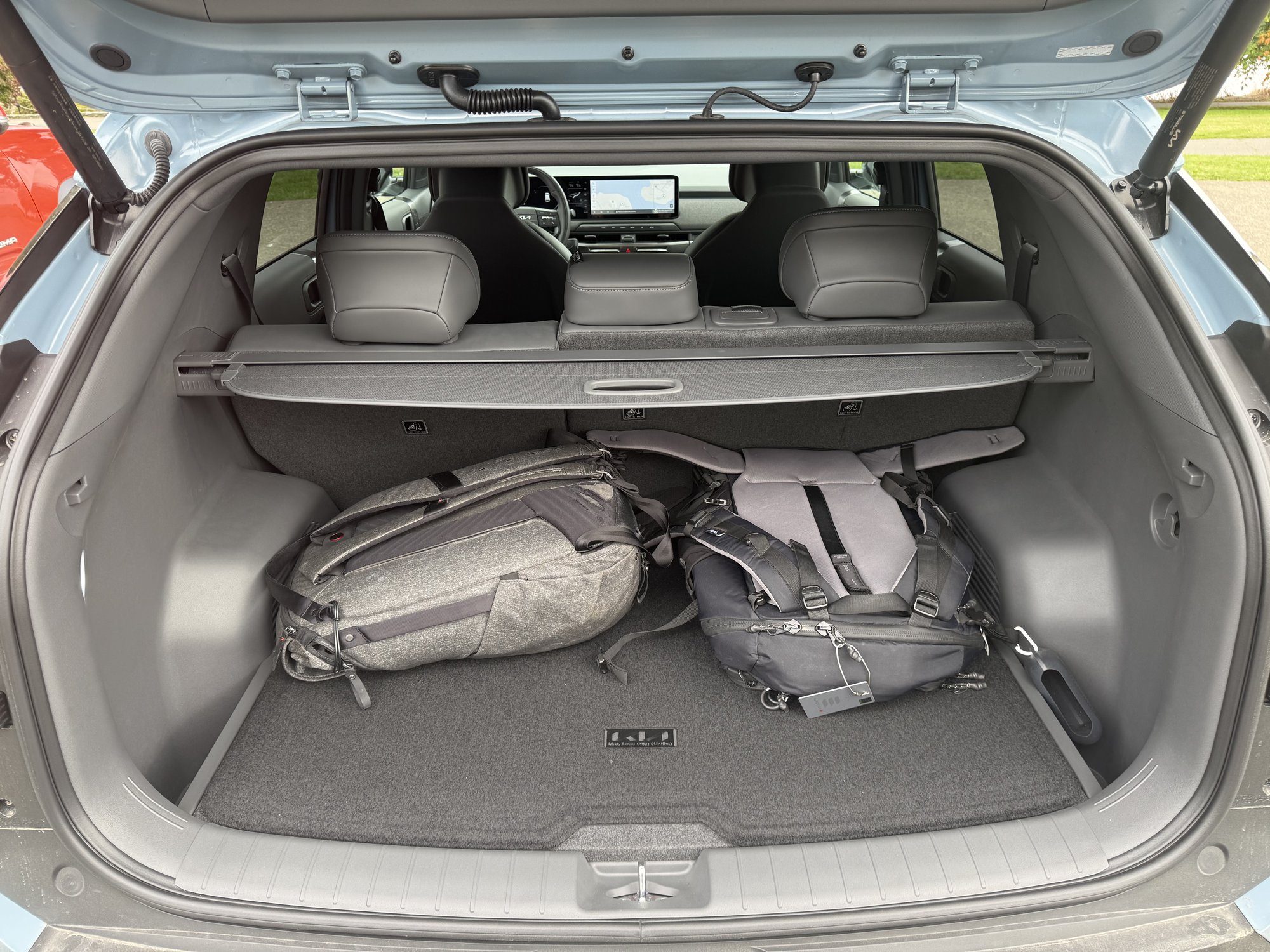 Kia EV3 trunk with two backpacks