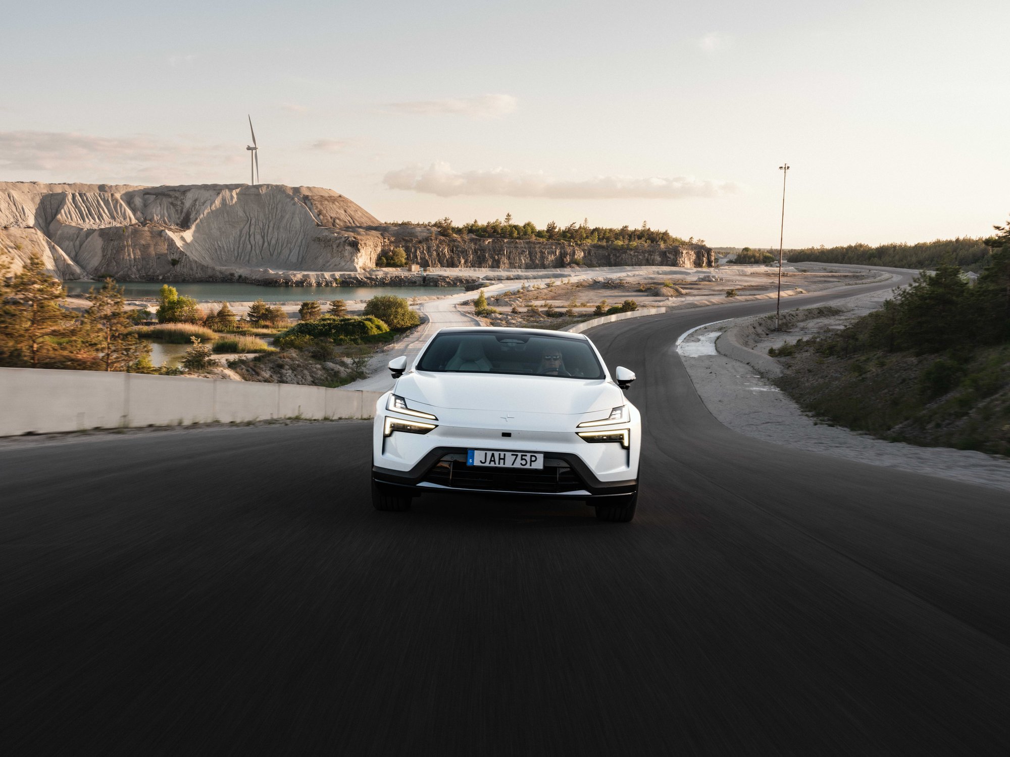 White Polestar 4 driving on the Gotland Ring in Sweden during the Oxford performance study