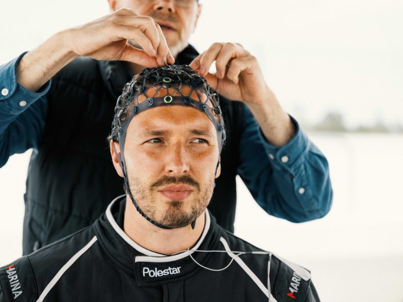 A Polestar study participant being fitted with an electrode cap before a test session