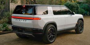 Image 19: Rivian R2 in white, rear three-quarter view